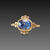 Oval Sapphire Ring with Diamond Trios