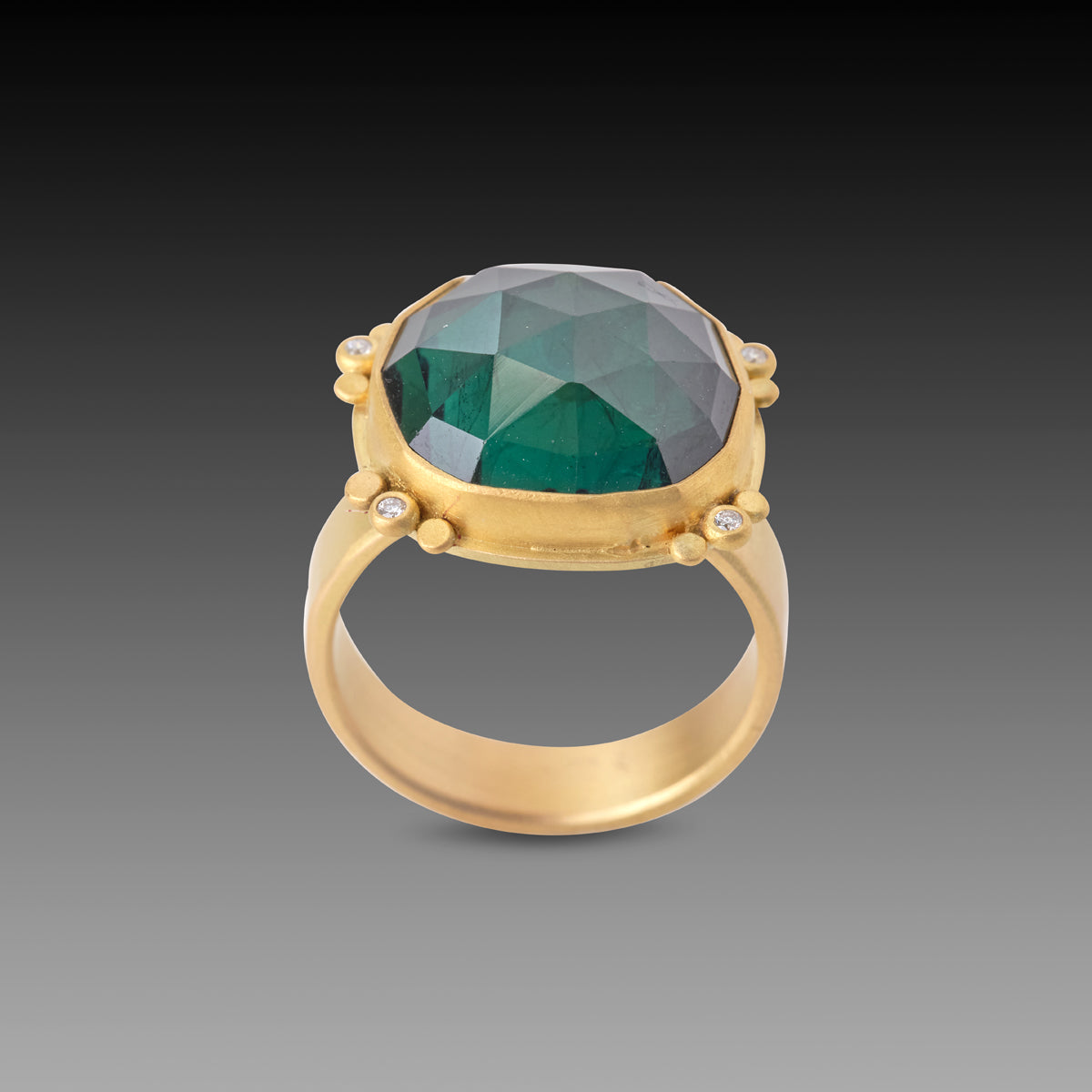 Green Tourmaline Ring with Gold Trios