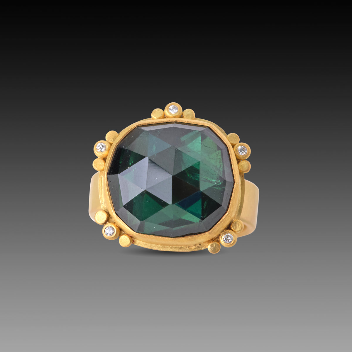 Green Tourmaline Ring with Gold Trios