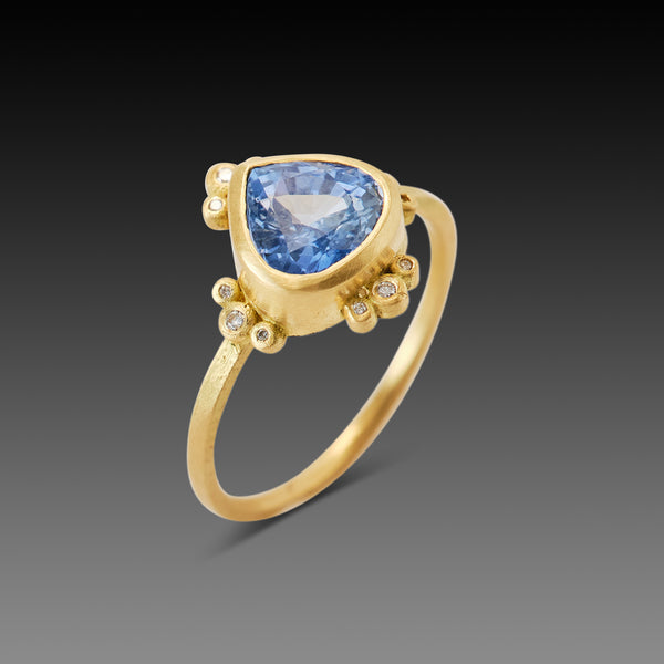 Pear Sapphire Ring with Diamond Trios
