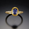 Oval Blue Sapphire Ring with Raised Diamond Band
