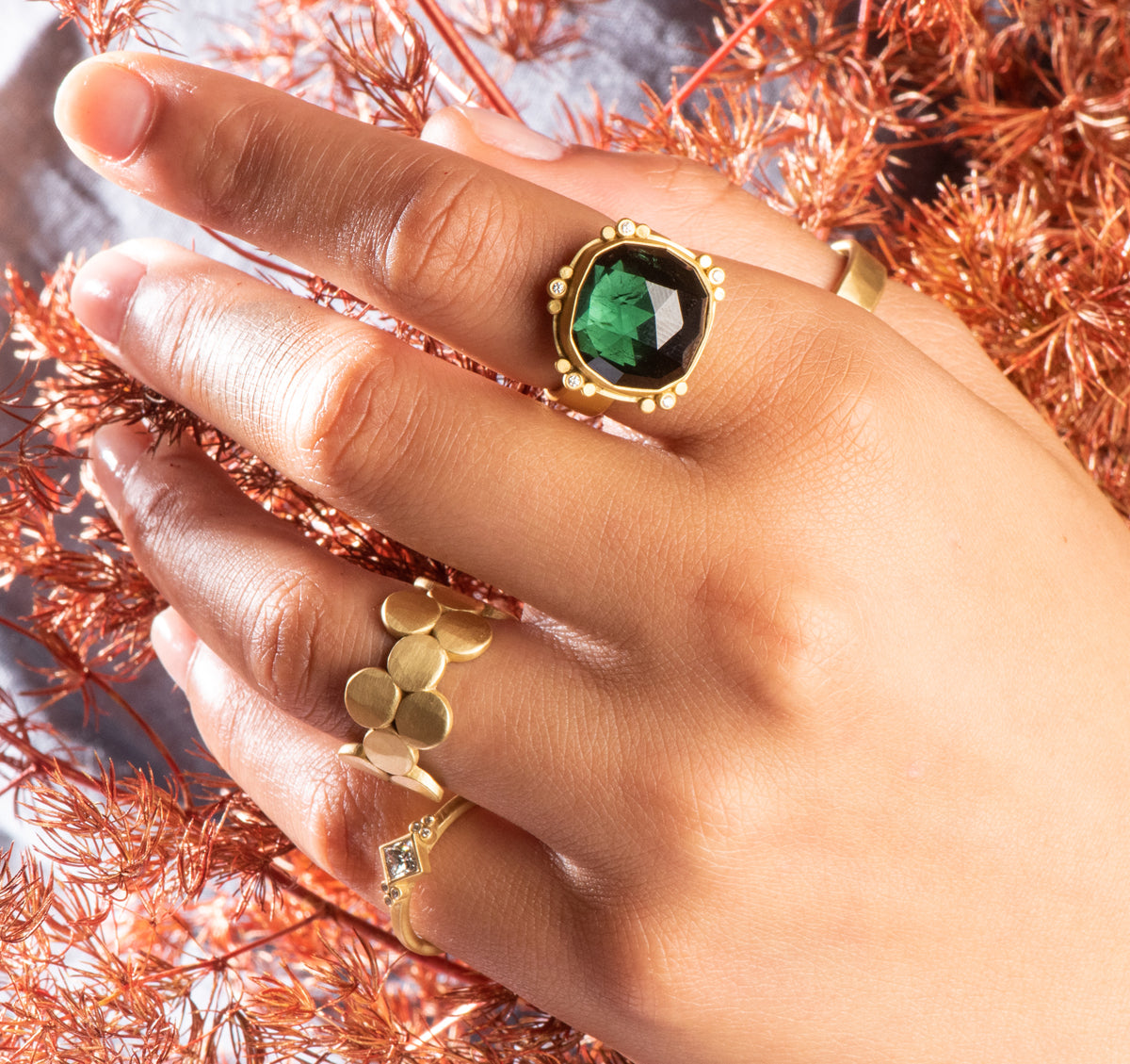 Green Tourmaline Ring with Gold Trios